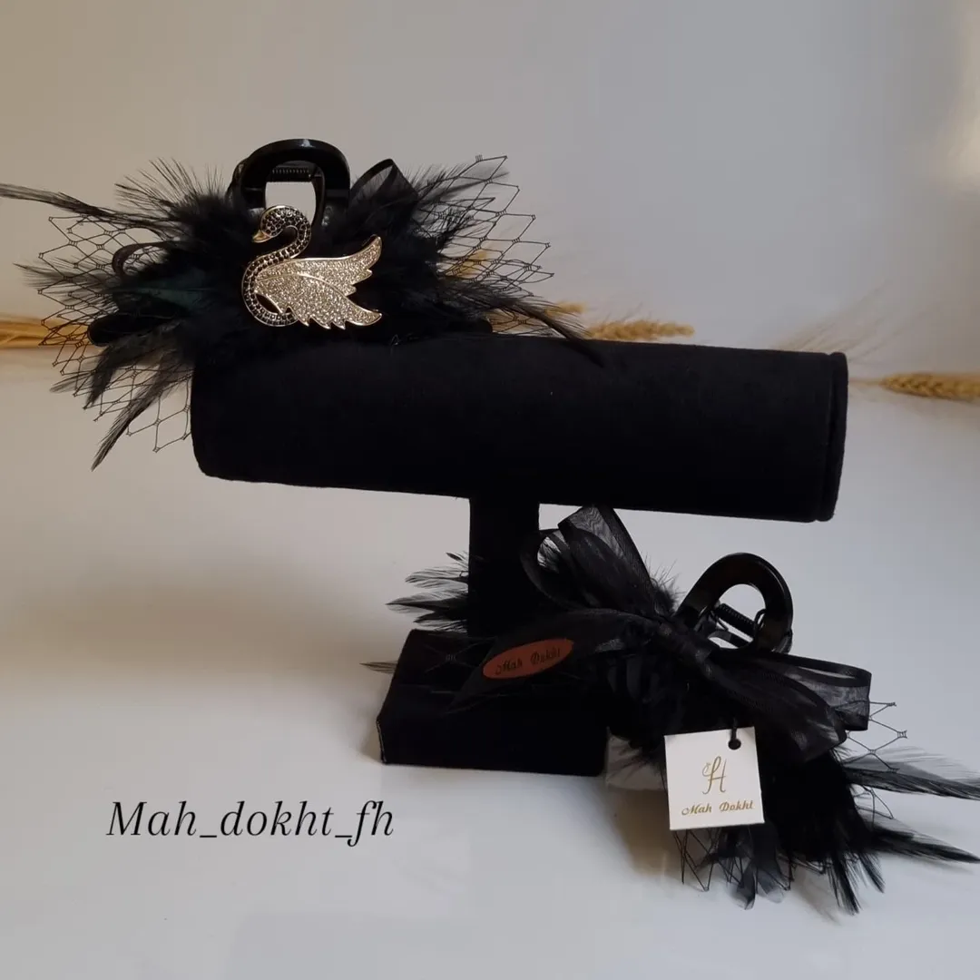 کلیپس قو و پاپیون